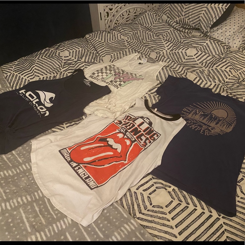 4 total (3 L tanks 1 XL tee fits like a large)